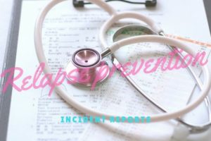ピンクの聴診器とインシデントレポート